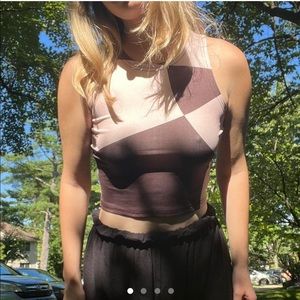 Cute asymmetrical checkered crop top. Worn once! Size S but stretchy.